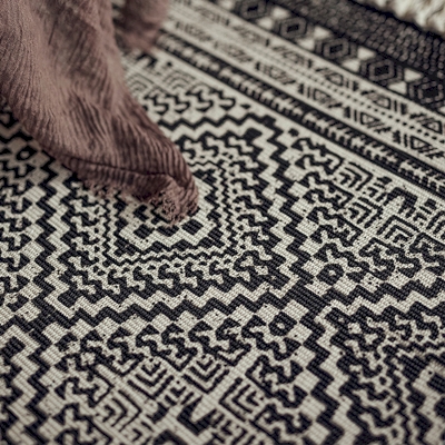 Handwoven Black and White Fringe Rug