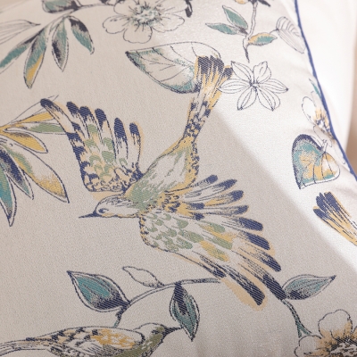 Coussin Eden, Jacquard Floral et Oiseaux avec Finition Roulée
