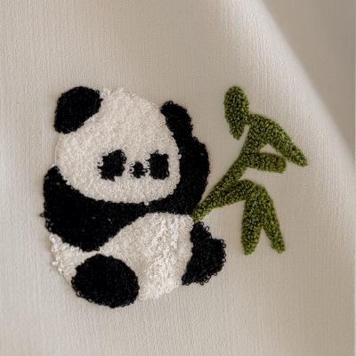 Custom-made children's curtains by PANDINE, embroidered chenille fabric, playful panda design
